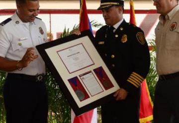 Cuerpo de Bomberos firma acuerdo con la NFPA