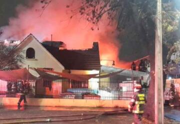 Seis bomberos lesionados tras violento incendio a fábrica textil