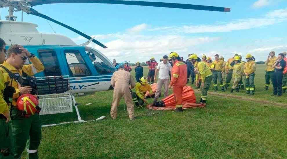 Bomberos y Defensa Civil se capacitaron en combate aéreo de incendios forestales